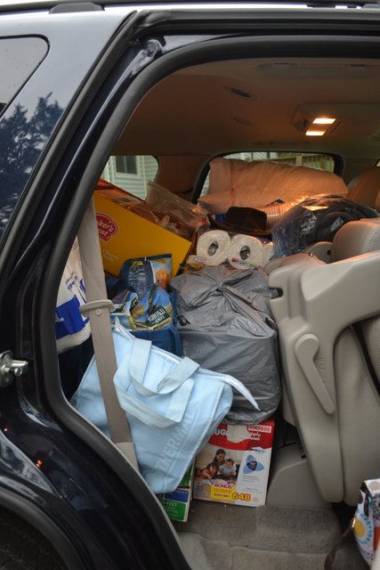 Vehicle loaded down with donations and tools to help the hurting