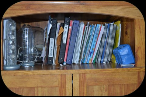 Our shelf of all books and notebooks used daily. 